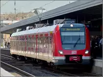 422 011-7 as urban train S 3 to the main station of Oberhausen pictured at the main station of Essen on April 2nd, 2011.