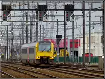 The diesel mulitple unit 4189 is arriving at the station of Hasselt on March 11th, 2011.
