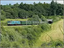 HLE 1501 with heritage M 2 wagons is leaving the tunnel near Von�che on June 28th, 2008.