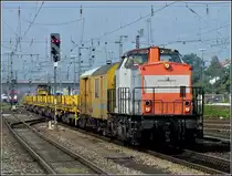 NBE 203 163-1 is running through the station of Regensburg on September 11th, 2010.