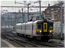 AM City Rail 965 is entering into the station Li�ge Guillemins on January 16th, 2010.