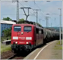151 141-9 is hauling a goods train through the station Koblenz-L�tzel on May 22nd, 2011.