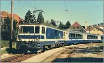 MOB GDe 4/4 with a Panoramic Express by Fontanivent. 
(Summer 1985/scanned Picture)