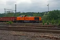 Locomotive 46 (MaK G 1700 BB) of the Kreisbahn Siegen-Wittgenstein (KSW) with freight train travels on 17.06.2011 at Scheuerfeld / Sieg, in the direction of Siegen.