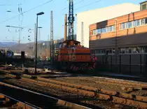 Locomotive No. 4 of the German steel works (DEW), formerly Edelstahlwerke S�dwestfalen, pulls loaded wagons on the factory rails on 29.01.2011 in Siegen-Geisweid. The locomotive is a MAK G 500 C,  built in 1975, Factory number 500 072, design type C-dh.