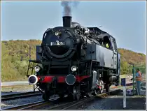 . The steam engine  Bubikopf  64.250 is entering into the station of Mariembourg on September 27th, 2009.