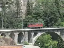 An Ae 6/6 drives back from poking service to Erstfeld, Wassen, 06.07.2011