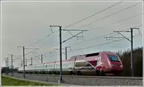 The PBKA Thalys 4341 is running on the highspeed track N� 3 near Baelen on March 20th, 2011.