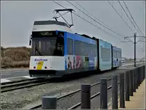 De Kusttram N� 6015 is running between Middelkerke and Raversijde on March 27th, 2011.