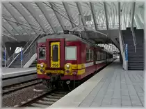 AM 63 250 is leaving the station Li�ge Guillemins on March 28th, 2010.