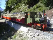 2 ft gauge steam engine  Liseli  (Jung No 1693, built 1911) in service on the high alpin panoramic railway of  Parc d'Attractions du Chatelard (VS)  in Switzerland.
In the first crossing station, awaiting a train crossing on the way to the station  Les Montuires . 11 Sept 2010