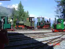 2 ft gauge steam engine  Liseli  (Jung No 1693, built 1911) in service on the high alpin panoramic railway of  Parc d'Attractions du Chatelard (VS)  in Switzerland.
During the  first international high alpine 2ft steam engine meeting  in front of the shed in  the station  Les Montuires  on 1'800 metres about sea level. 3 guest locomotives around  Liseli  (1 from Spain, 2 from Germany). All the visitors with their engines enjoyed this uncompare spectacle very good. Who knows, what time it would need until a next meeting could be realised on various steam again...? 01 Aug 2005