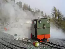 2 ft gauge steam engine  Liseli  (Jung No 1693, built 1911) in service on the high alpin panoramic railway of  Parc d'Attractions du Chatelard (VS)  in Switzerland.
Heating up the engine in the station  Les Montuires  on 1'800 metres about sea level during the 16th international 2ft gauge railway meeting . 20 October 2007