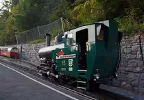 The heating oil-fired locomotive travels BRB 15 on 30.09.2011 (18:45 h) in the station Brienz (BRB).