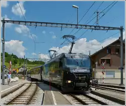 A Goldenpass train is arriving in Montbovon on May 28th, 2012.