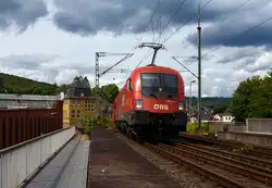 The Taurus II, �BB 1116 049 (91 81 1116 049-8 A-�BB) of �BB-Produktion GmbH, is running on June 11, 2026, with an automobile transport train of the Rail Cargo Group (double-deck automobile transport