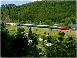 1604 is hauling heritage wagons through Clervaux on June 23rd, 2009.